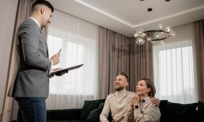 Canberra buyers agent helping a couple find and inspect a property in Canberra's competitive real estate market.