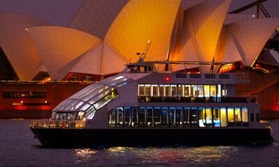 Dinner cruise passing the Sydney Opera House at night