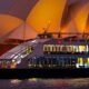Dinner cruise passing the Sydney Opera House at night
