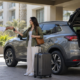 Crossover vehicle handover outside a Dubai residence for an extended stay