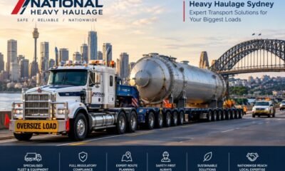 Heavy haulage Sydney by National Heavy Haulage, featuring a prime mover transporting an oversized industrial vessel on a multi-axle low-loader near the Sydney Harbour Bridge.
