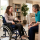 Young adult with a physical disability receiving support in a residential respite care setting.