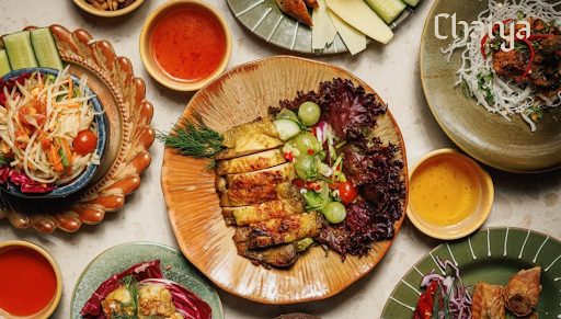 Regional Thai dishes from Chaiya's menu shared on one table